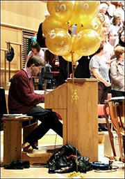 Picture of Cameron at the organ